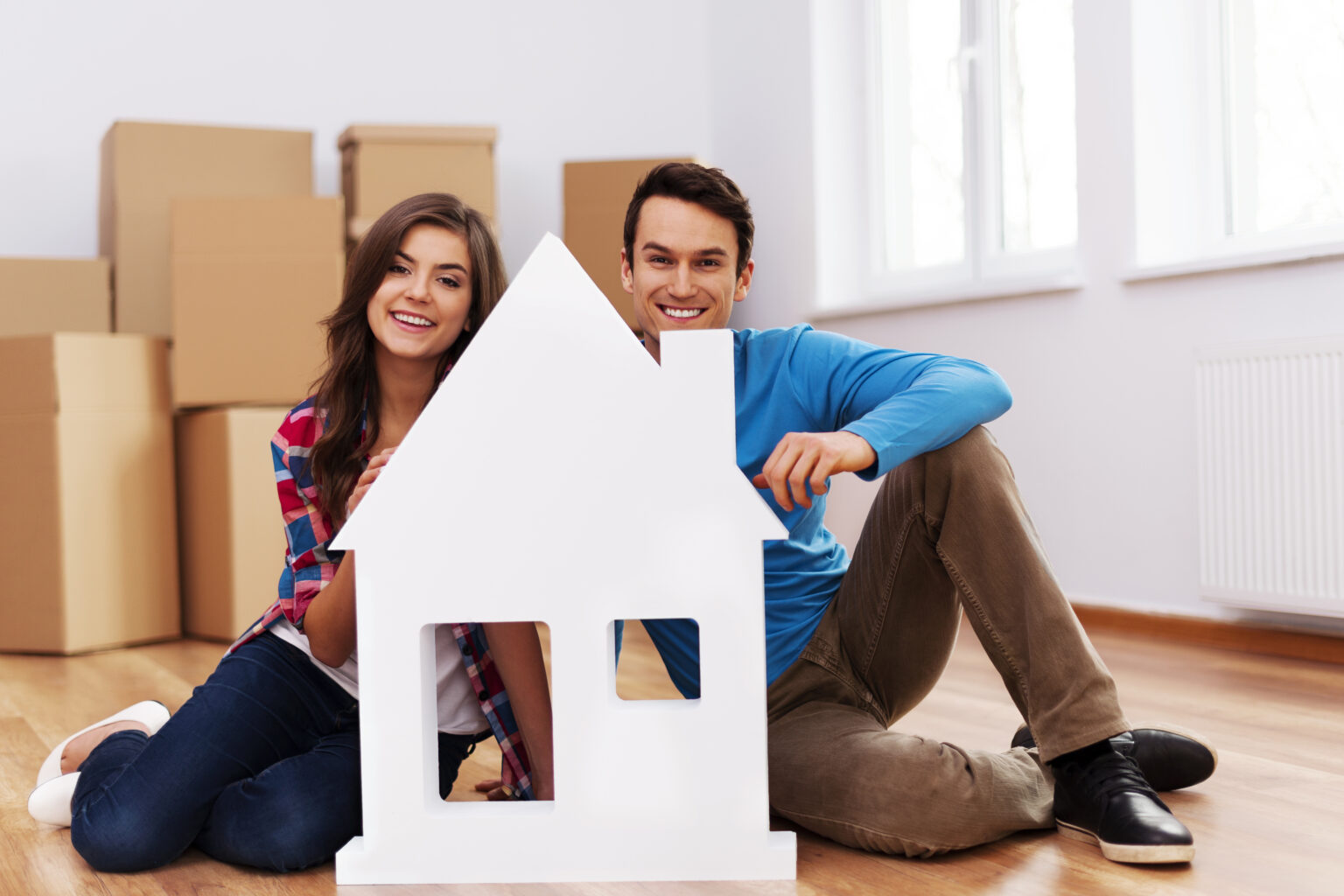 Young Couple enjoying the time after Home and Property Insurance: